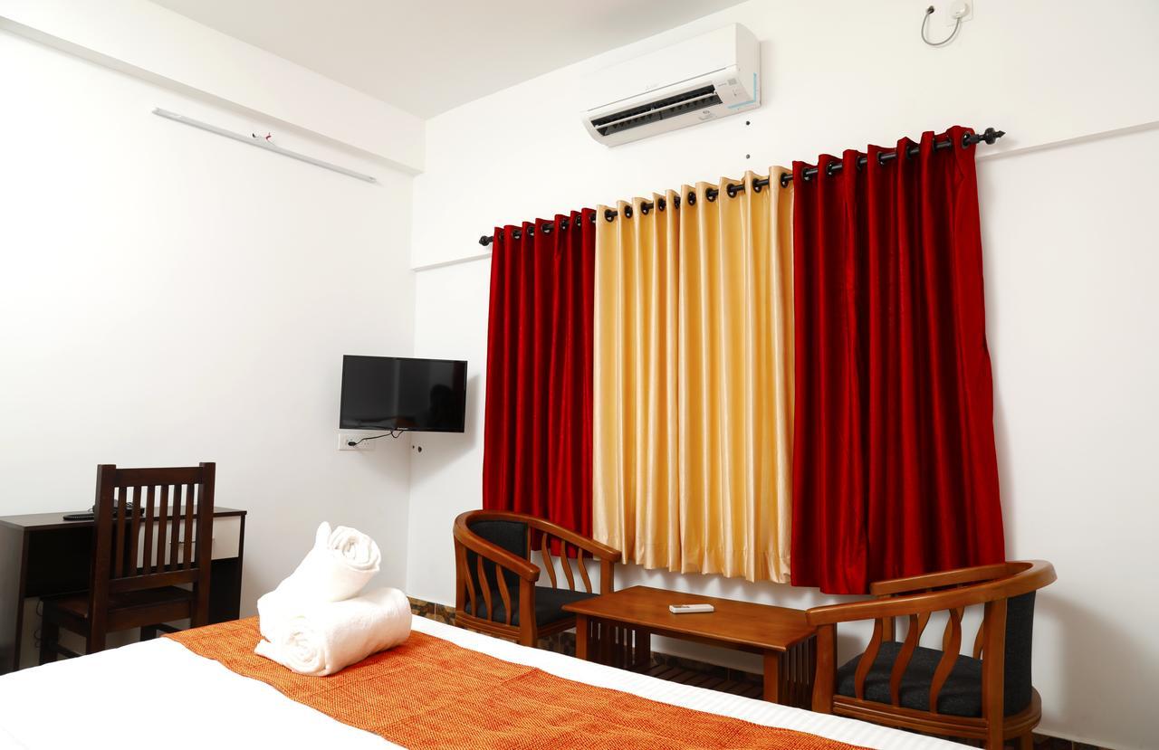 Puthens Clifton Inn Kottayam Exterior photo