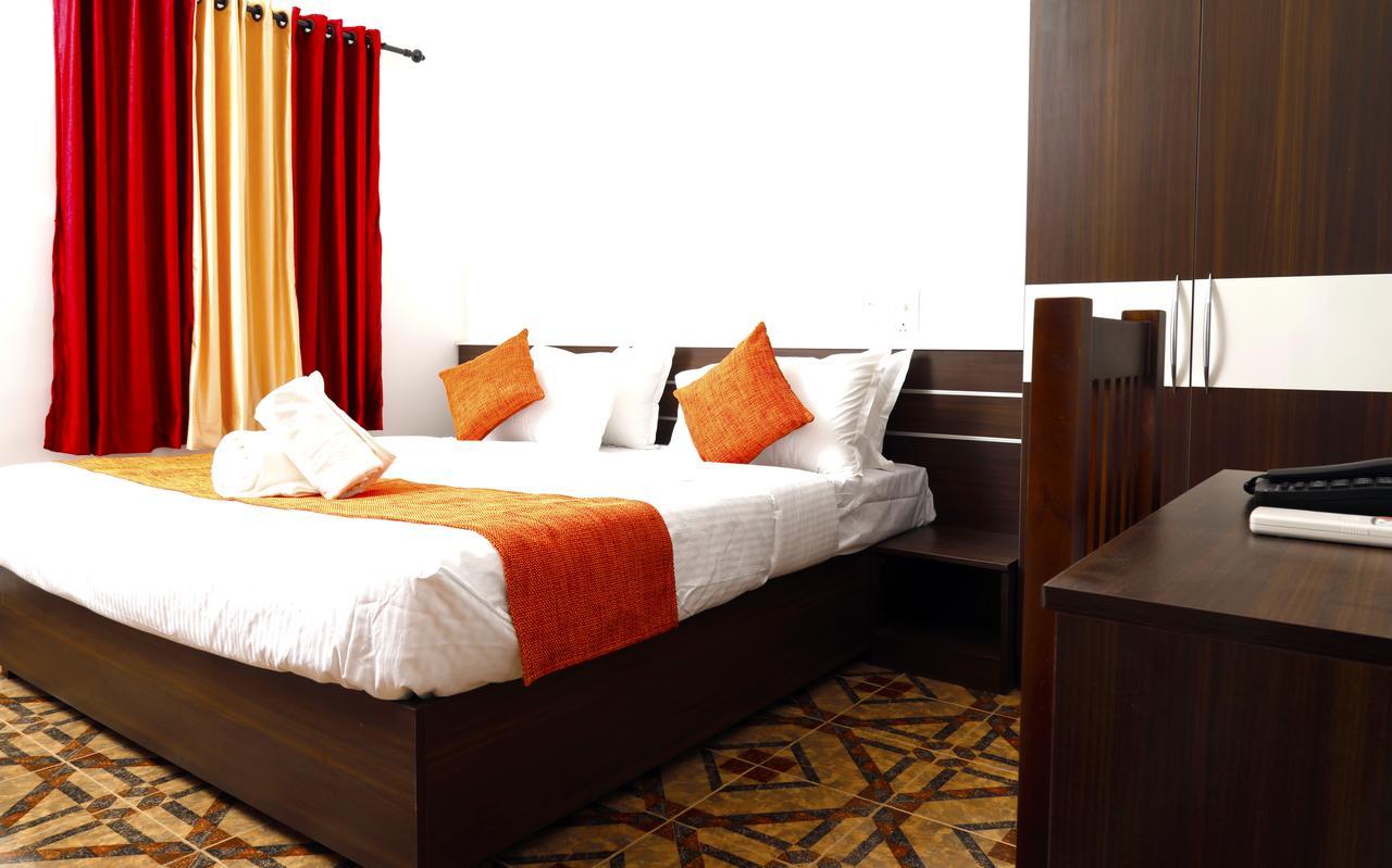Puthens Clifton Inn Kottayam Exterior photo