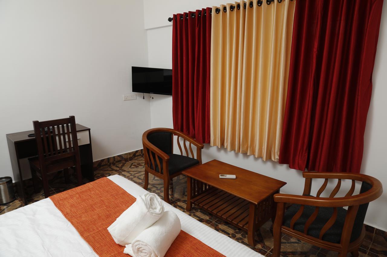 Puthens Clifton Inn Kottayam Exterior photo
