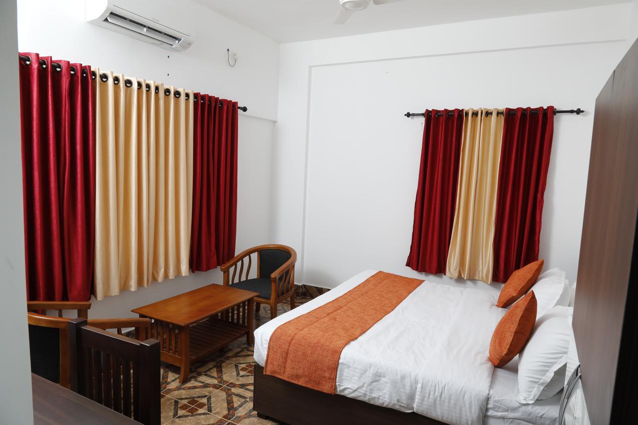 Puthens Clifton Inn Kottayam Exterior photo
